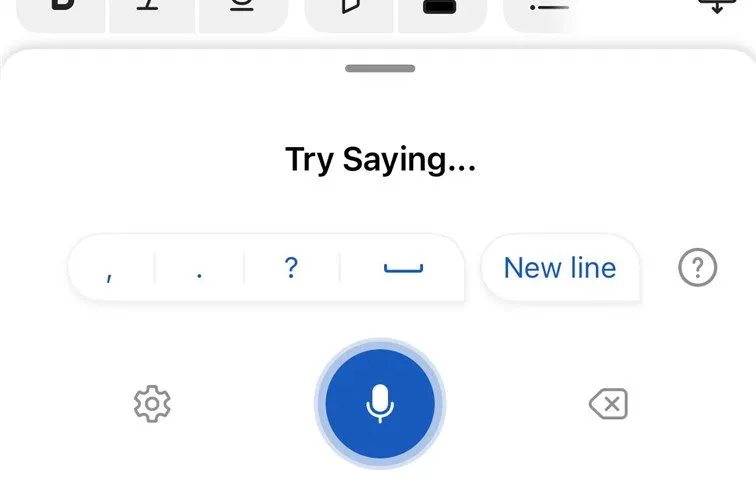 Công cụ đọc chính tả trong ứng dụng Microsoft Word iOS đang hoạt động với biểu tượng micrô màu xanh nhấp nháy.