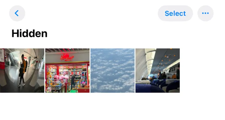 Giao diện album Đã ẩn trên iOS 18, hiển thị các hình ảnh và video đã được giấu.