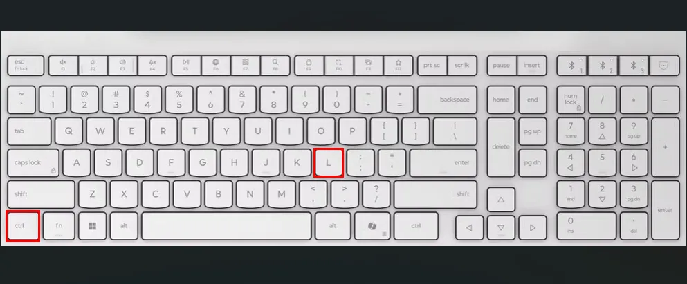 Bàn phím màu trắng với các ô màu đỏ làm nổi bật các phím Ctrl và L để xóa màn hình Terminal trên Ubuntu.