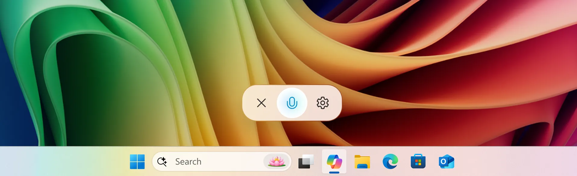 Biểu tượng micro trên thanh tác vụ Windows 11 khi tính năng "Hey, Copilot" đang lắng nghe.