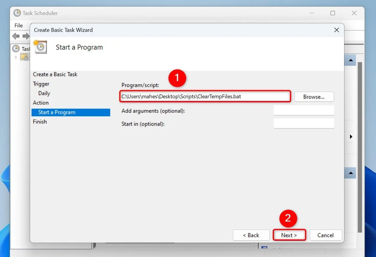 Chỉ định đường dẫn đầy đủ đến file script &quot;ClearTempFiles.bat&quot; trong cửa sổ cấu hình tác vụ Task Scheduler.