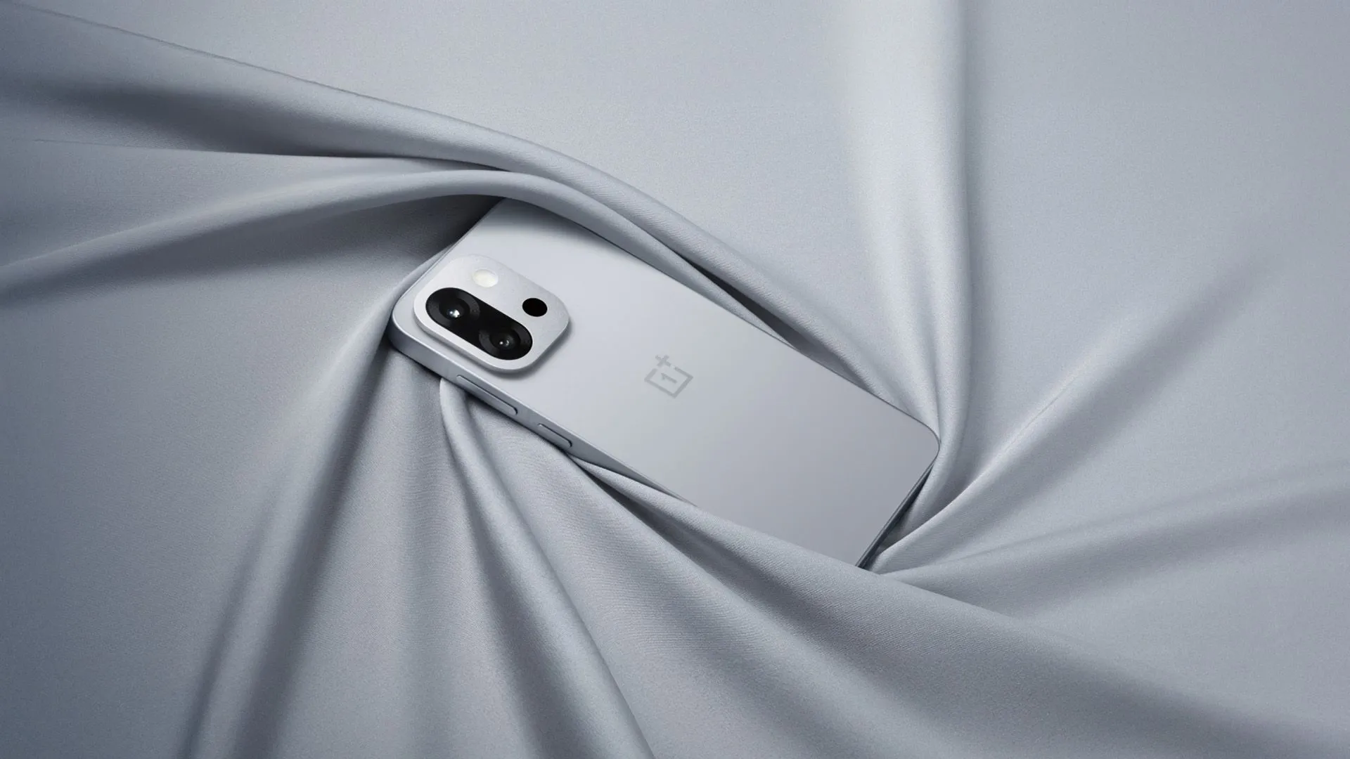 Điện thoại OnePlus 13T màu đen với thiết kế camera tròn nổi bật và màn hình hiển thị