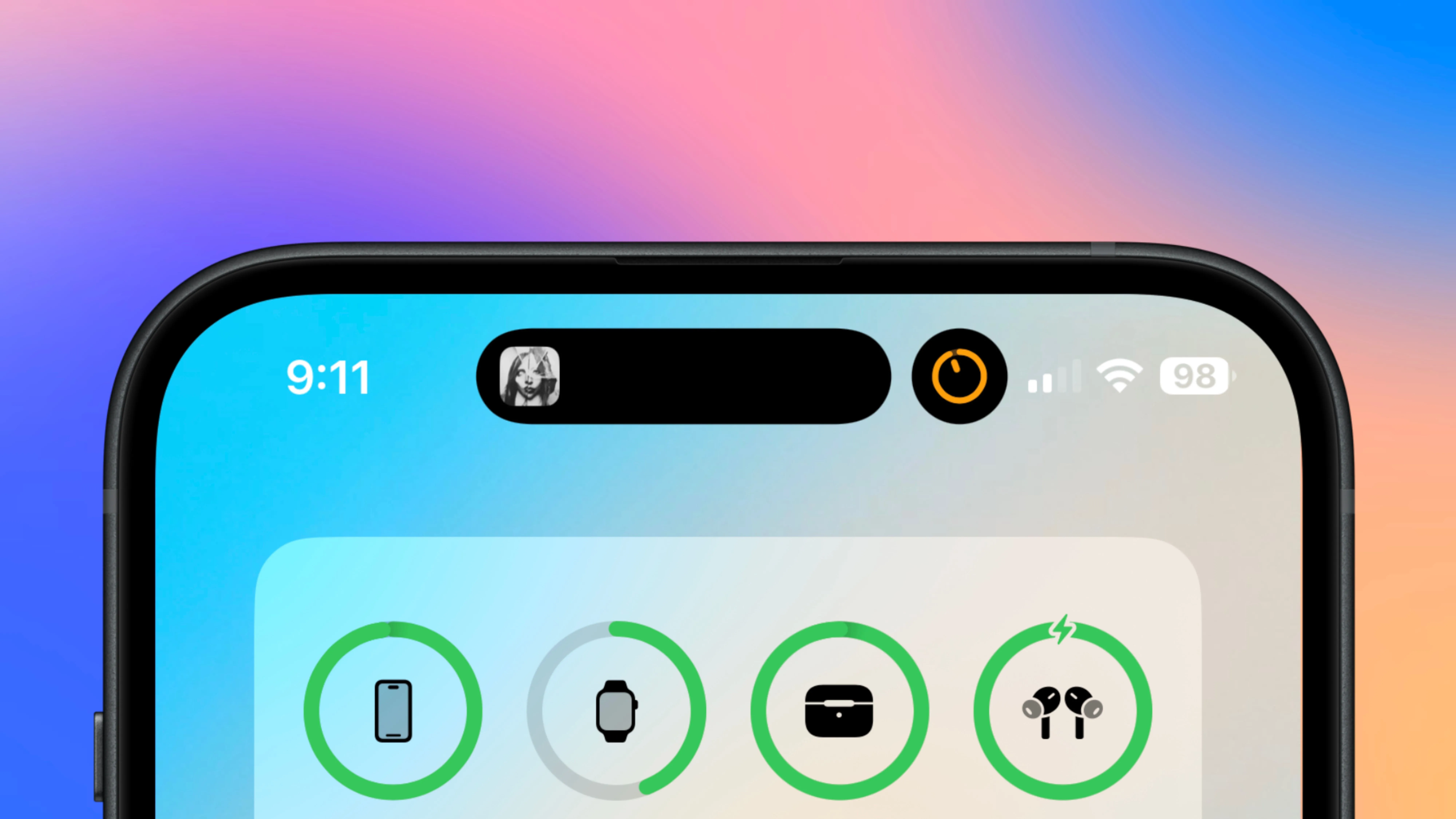 Dynamic Island trên iPhone đang hiển thị trình phát nhạc và bộ hẹn giờ