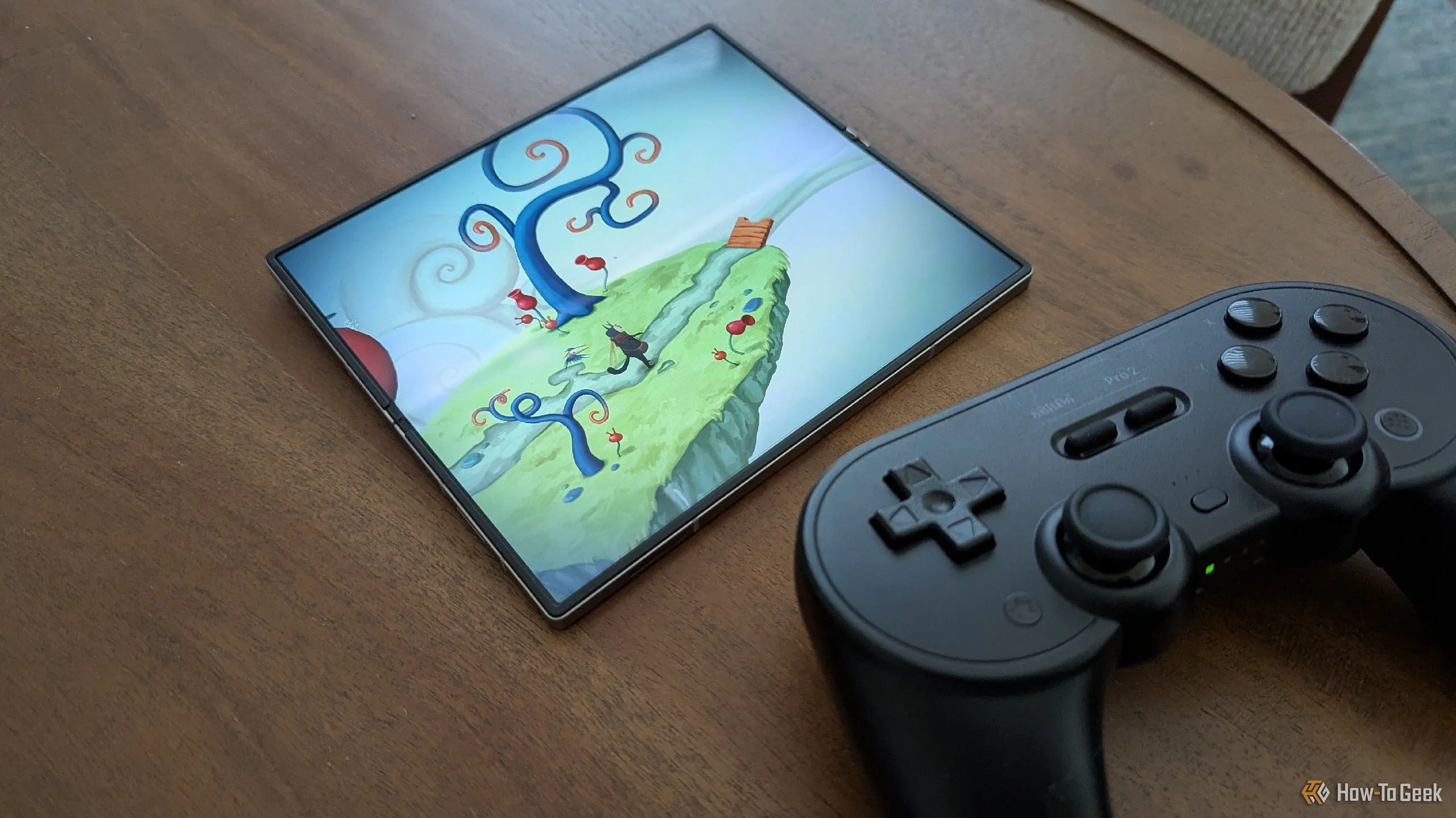 Game Figment trên Galaxy Z Fold 6 cùng tay cầm 8BitDo Pro 2, minh họa lối chơi nhập vai phiêu lưu độc đáo.