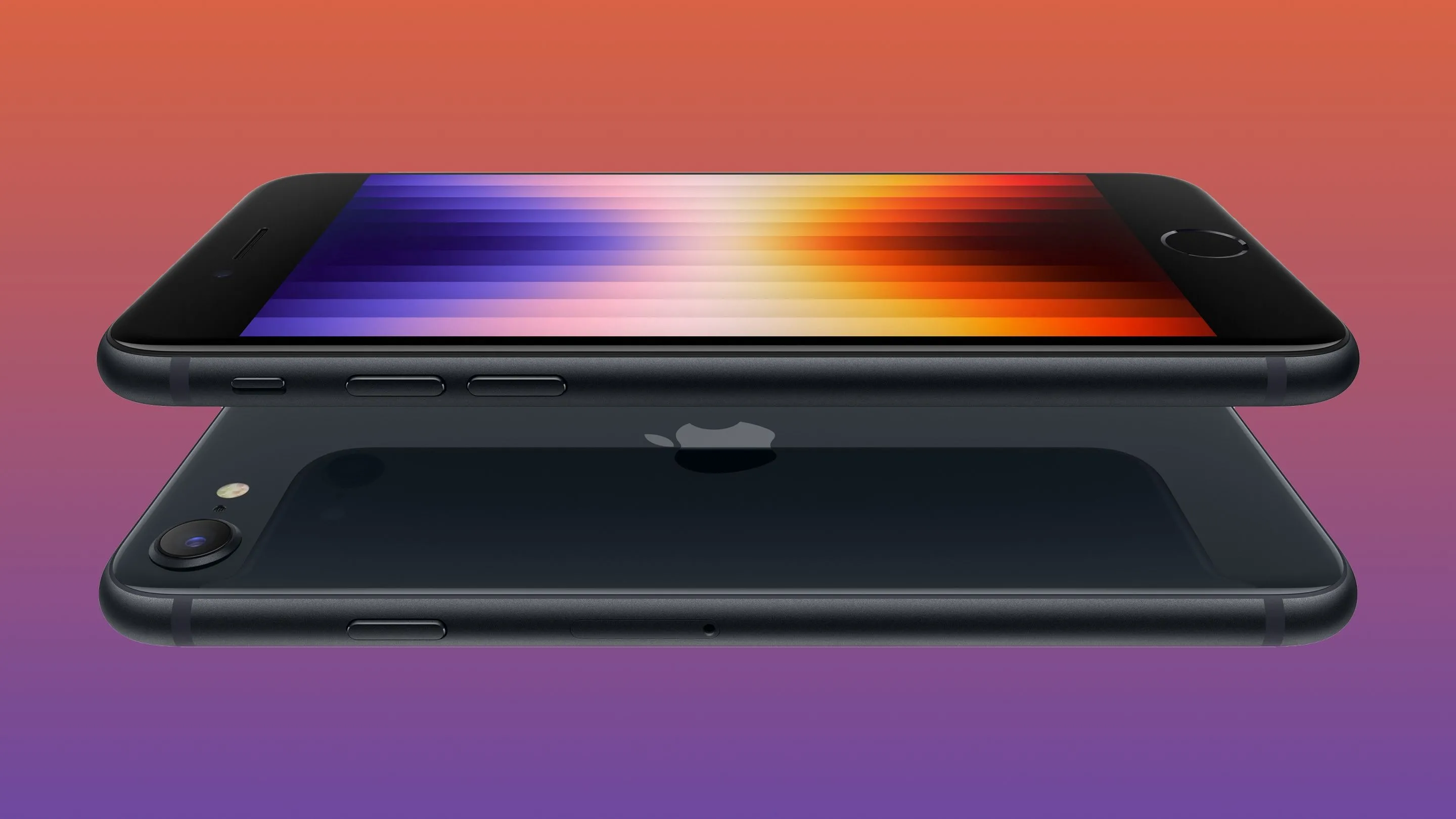 Hai chiếc iPhone SE thế hệ thứ ba (2022) được đặt chồng lên nhau, thể hiện các tùy chọn màu.