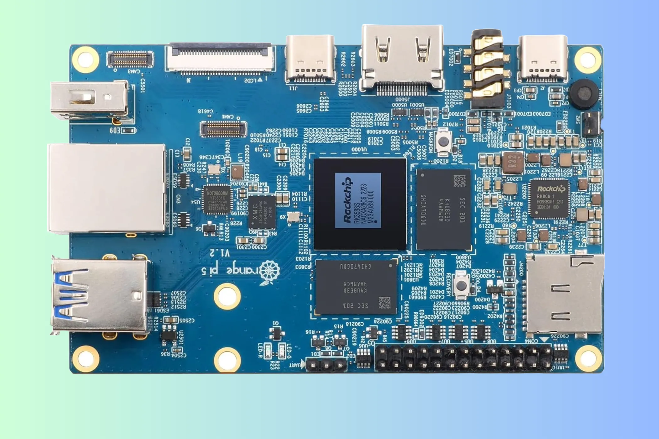 Hình ảnh bo mạch máy tính đơn Orange Pi 5 Plus trên nền xanh dương, thể hiện các cổng kết nối và linh kiện