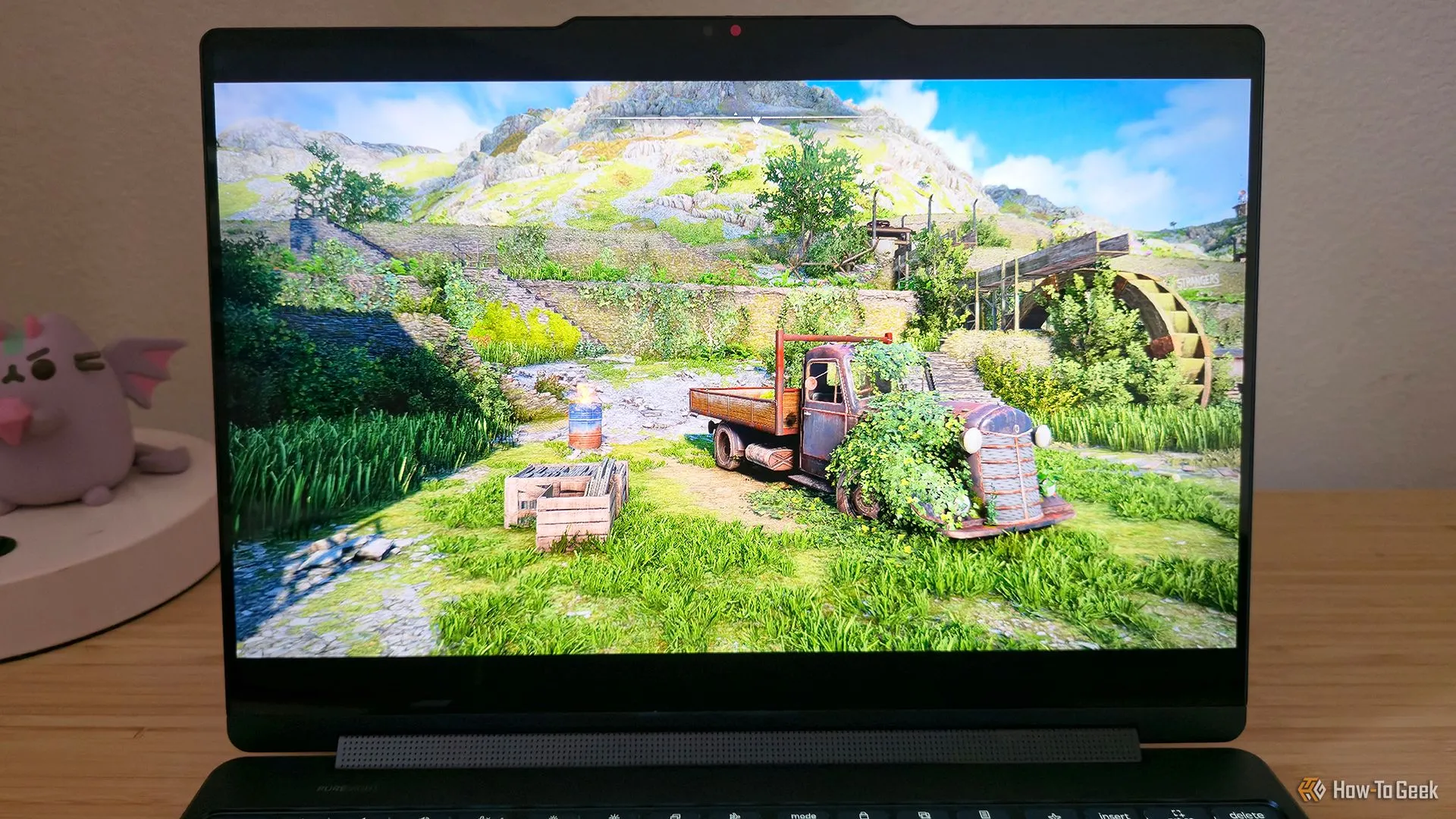 Laptop Lenovo Yoga 9i 2-in-1 Gen 10 chơi game Atomfall, minh họa khả năng xử lý đồ họa tích hợp Intel Arc cho game nhẹ.
