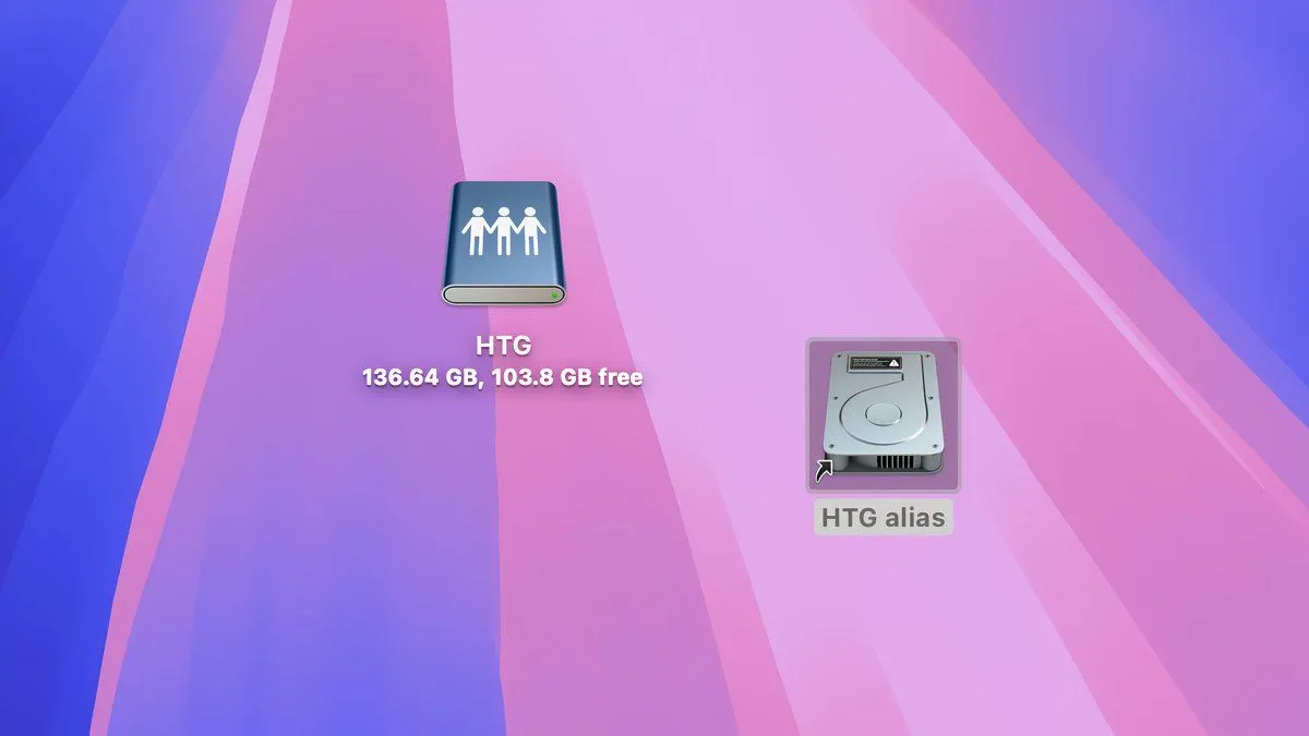 Màn hình nền macOS hiển thị các biểu tượng cho một chia sẻ mạng và bí danh của nó.