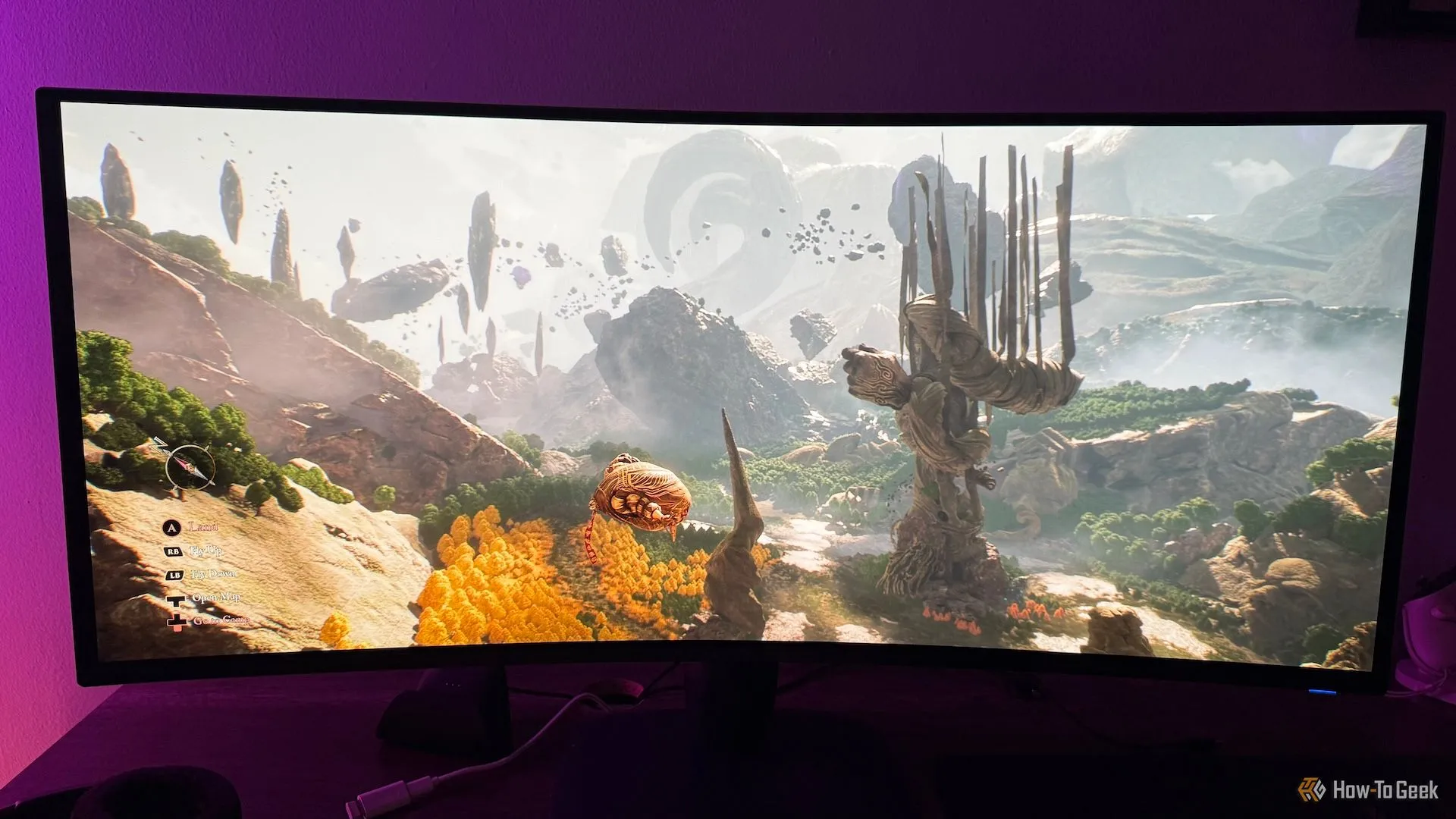 Nhân vật Esquie bay trong thế giới game Clair Obscur: Expedition 33 trên màn hình chơi game Alienware AW3425DW.