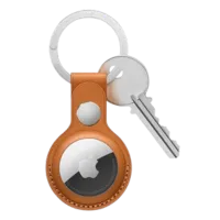 Thiết bị định vị Apple AirTag trên nền trong suốt, minh họa khả năng theo dõi vật phẩm của AirTag