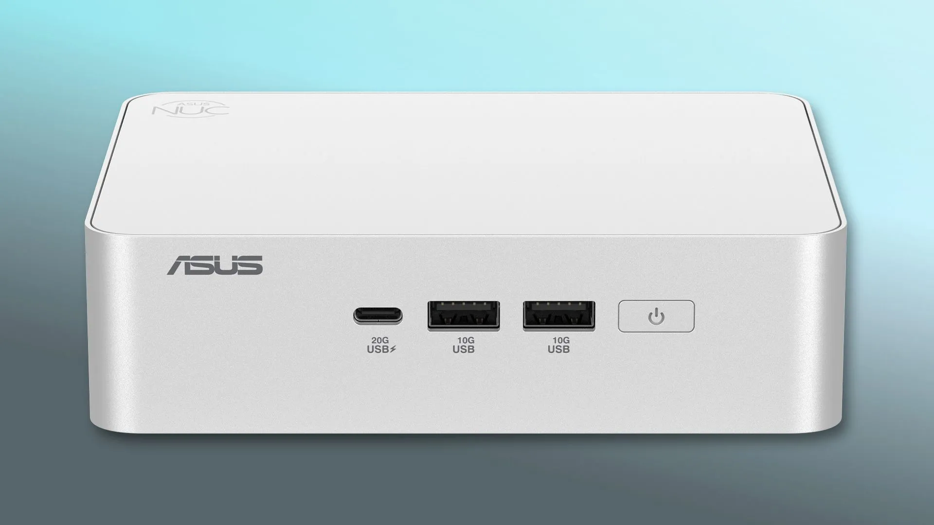 Thiết bị mini PC ASUS NUC 15 Pro+ với thiết kế tối giản, đặt cạnh bàn phím và chuột.