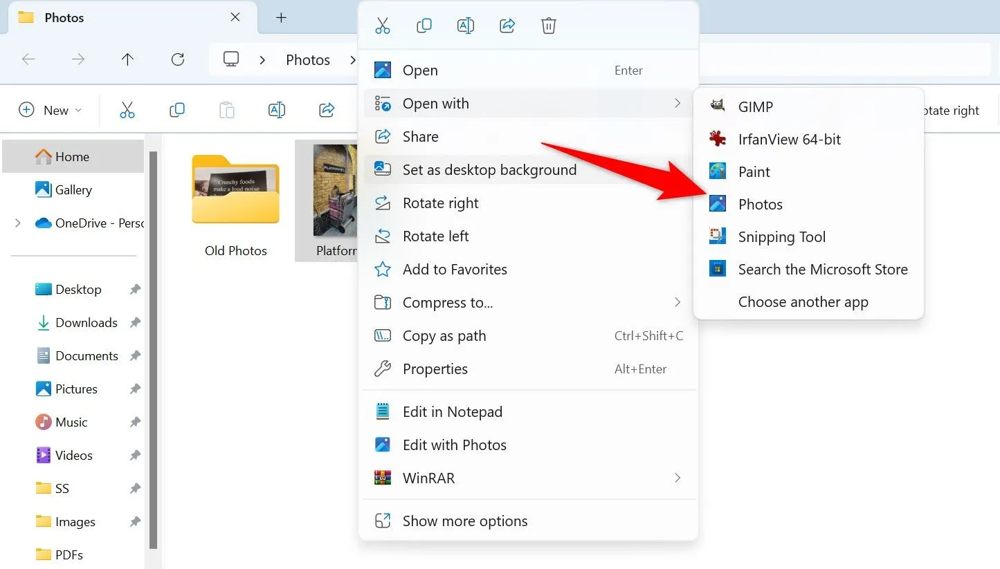 Tùy chọn Open With &gt; Photos được làm nổi bật cho một bức ảnh trong File Explorer.