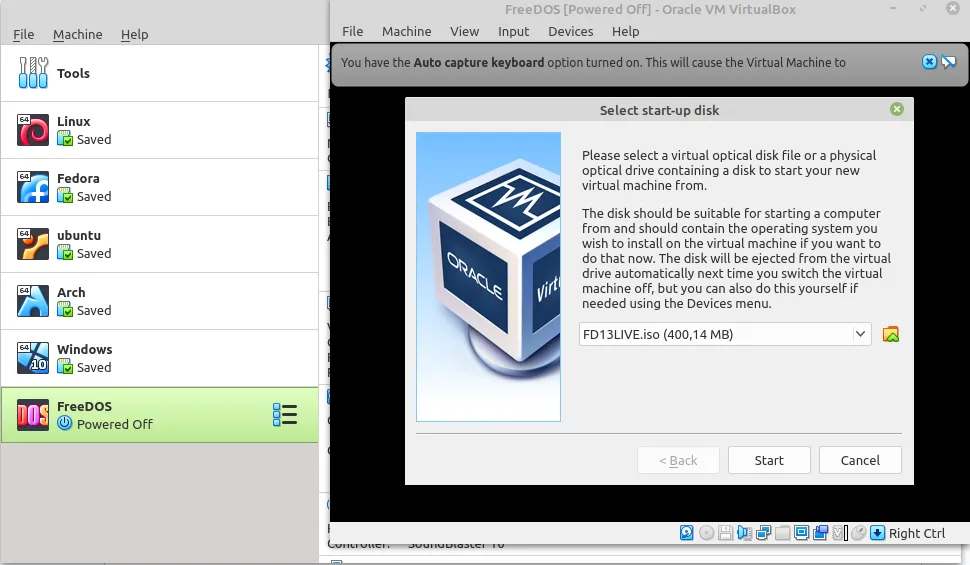 Chọn tệp ISO FreeDOS LiveCD để khởi động máy ảo trong VirtualBox.
